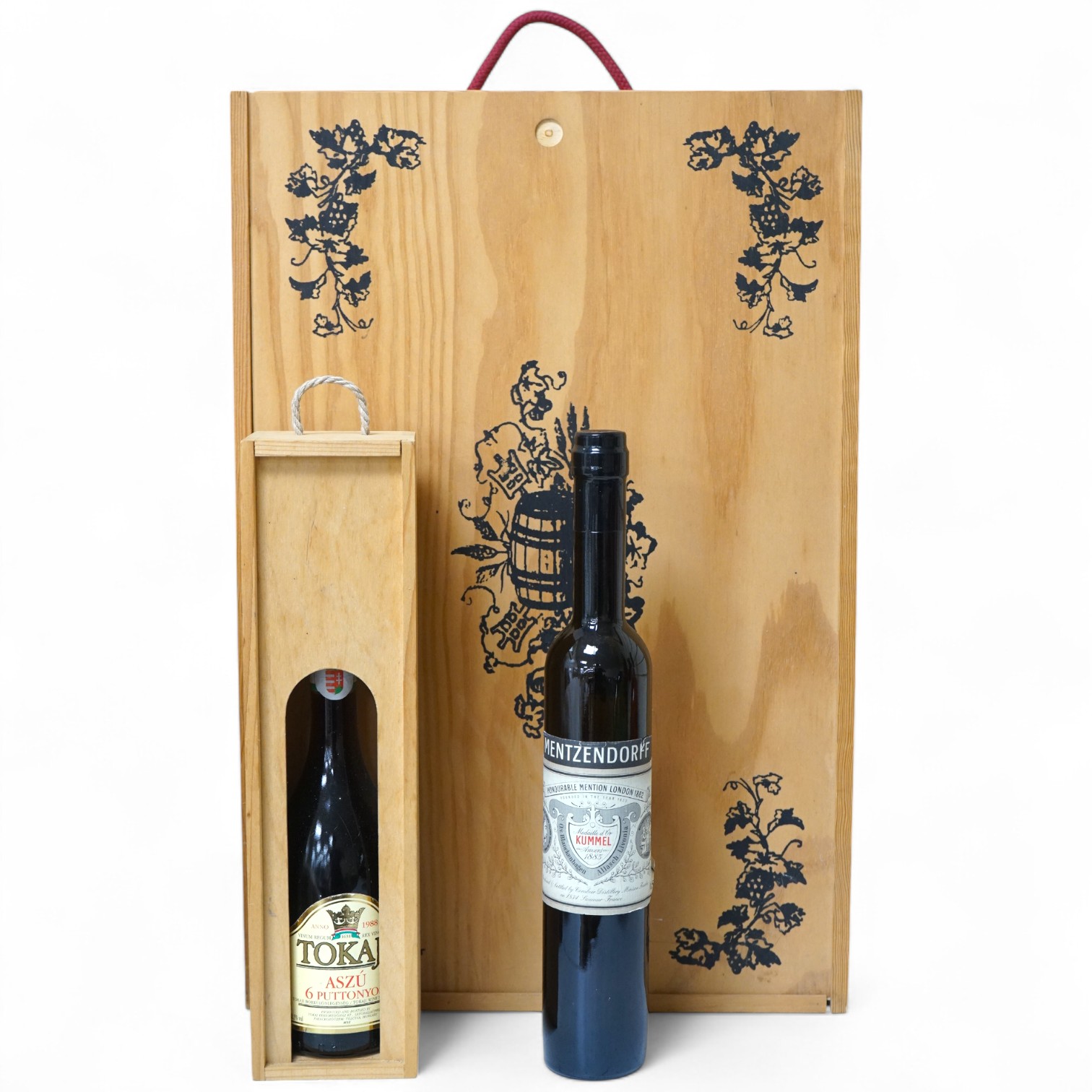 One bottle of Kummel, another, Tokaji, and a Joyeux Anniversaire, cased